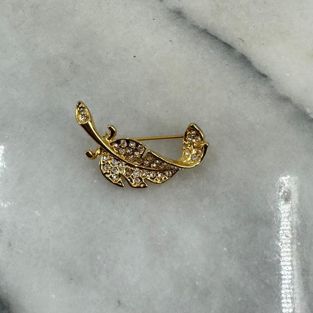 Vintage gold rhinestone leaf brooch